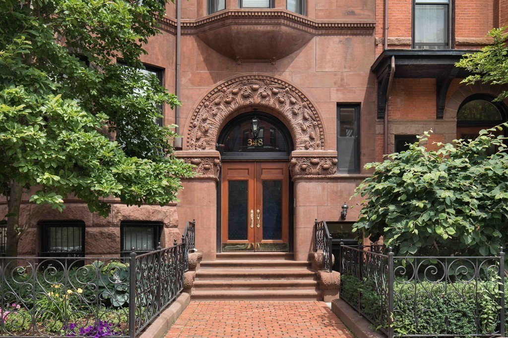 348 Beacon Street, Unit PH Boston, MA 02116 - Photo 34 of 34 a front view of a house with plants