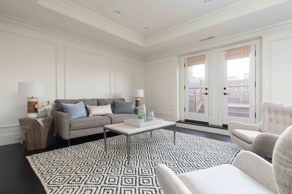 348 Beacon Street, Unit PH Boston, MA 02116 - Photo 6 of 34 a living room with furniture