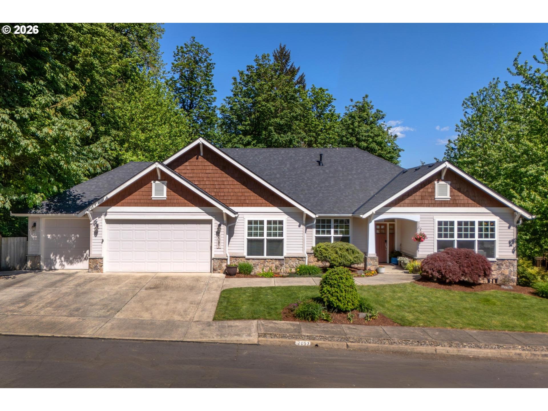 front view of a house with a yard