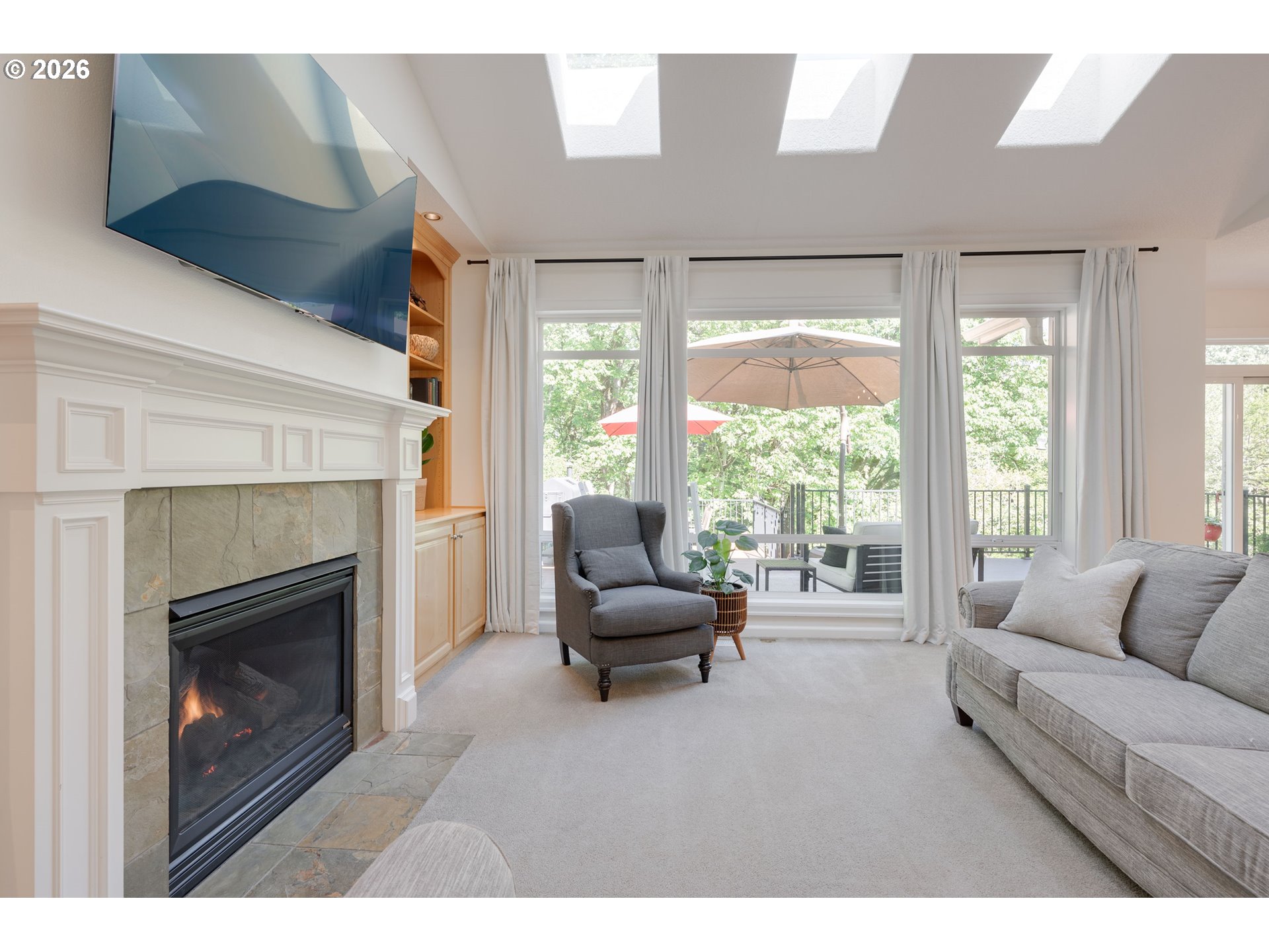 2097 Southwest Nancy Drive Gresham, OR 97080 - Photo 5 of 46 a living room with furniture and a fireplace
