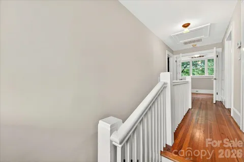 a view of entryway with wooden floor