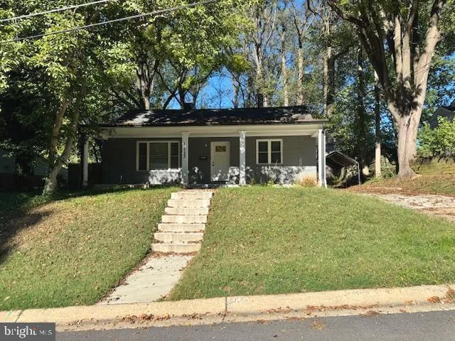 front view of a house with a patio