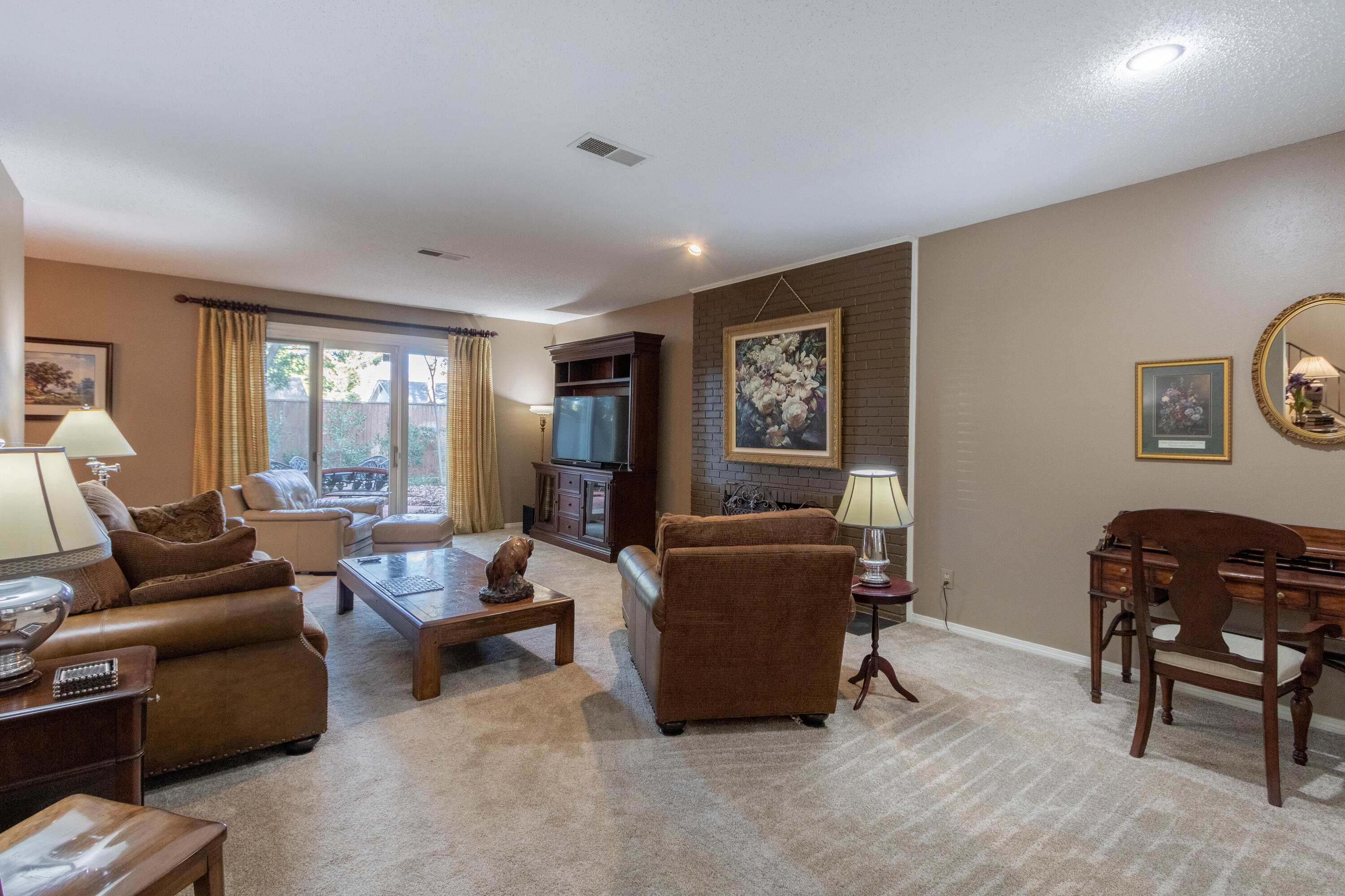 3722 63rd Drive Lubbock, TX 79413 - Photo 13 of 63 a living room with furniture and a window