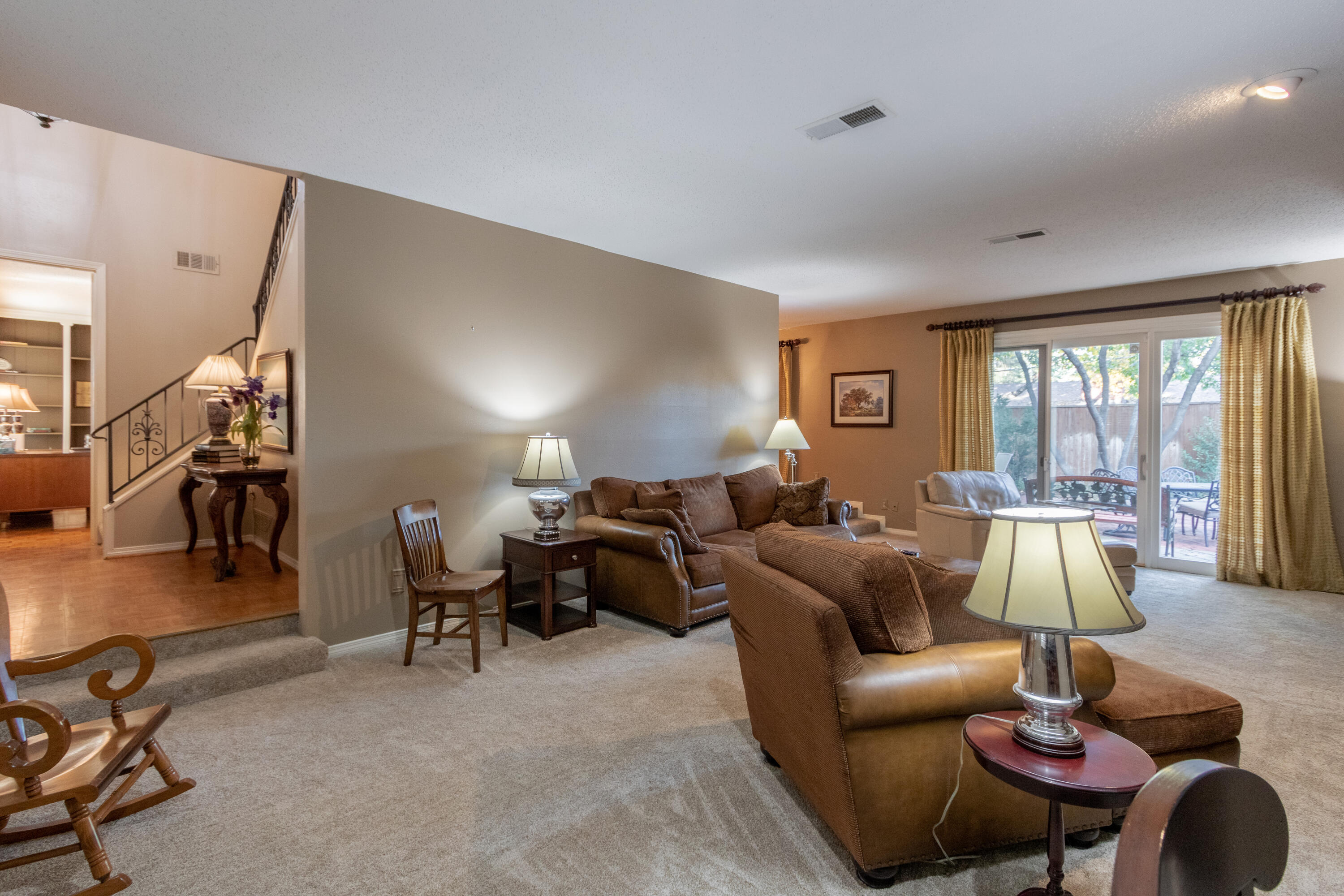 3722 63rd Drive Lubbock, TX 79413 - Photo 14 of 63 a living room with furniture and a large window