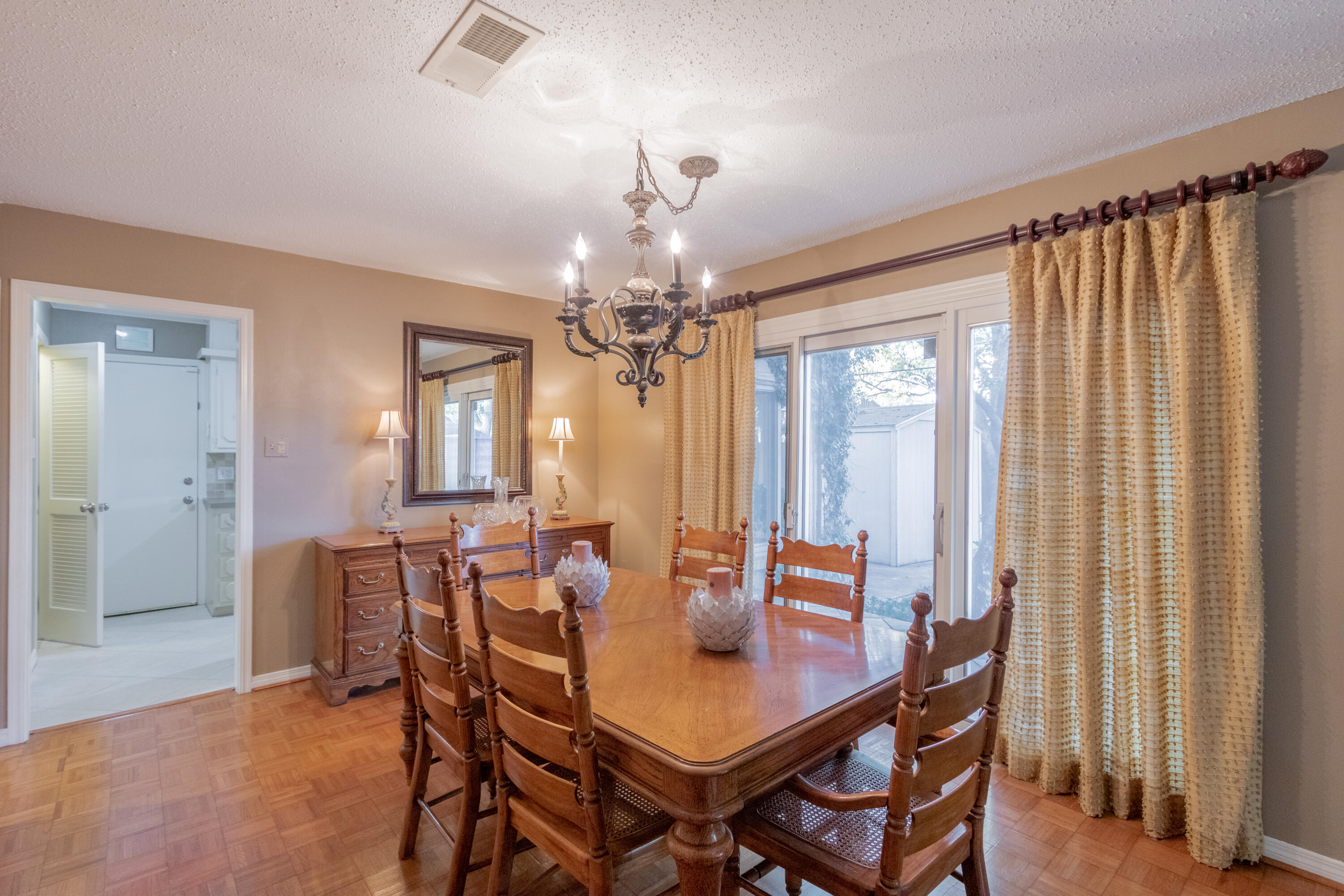 3722 63rd Drive Lubbock, TX 79413 - Photo 18 of 63 a view of a dining room with furniture window and outside view