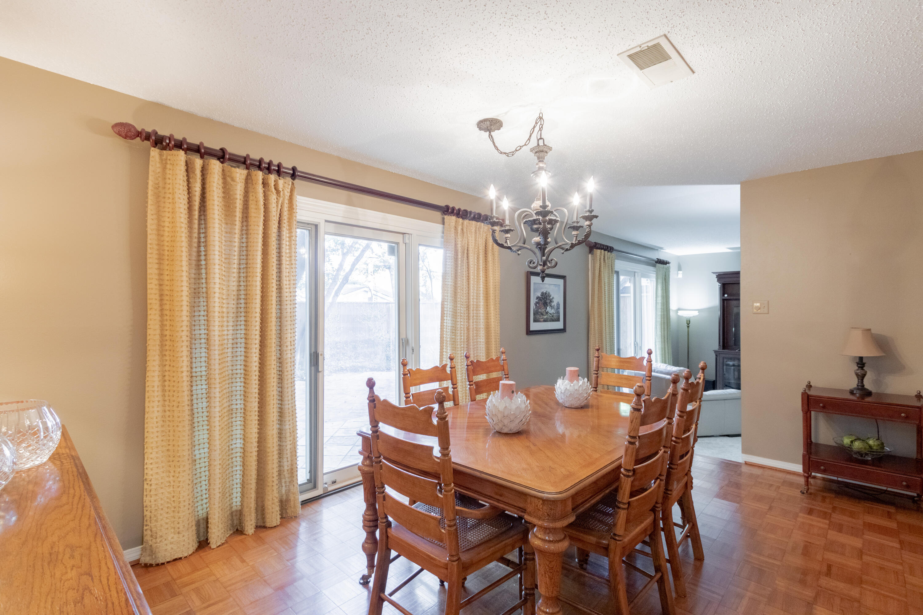 3722 63rd Drive Lubbock, TX 79413 - Photo 19 of 63 a view of a dining room with furniture window and wooden floor