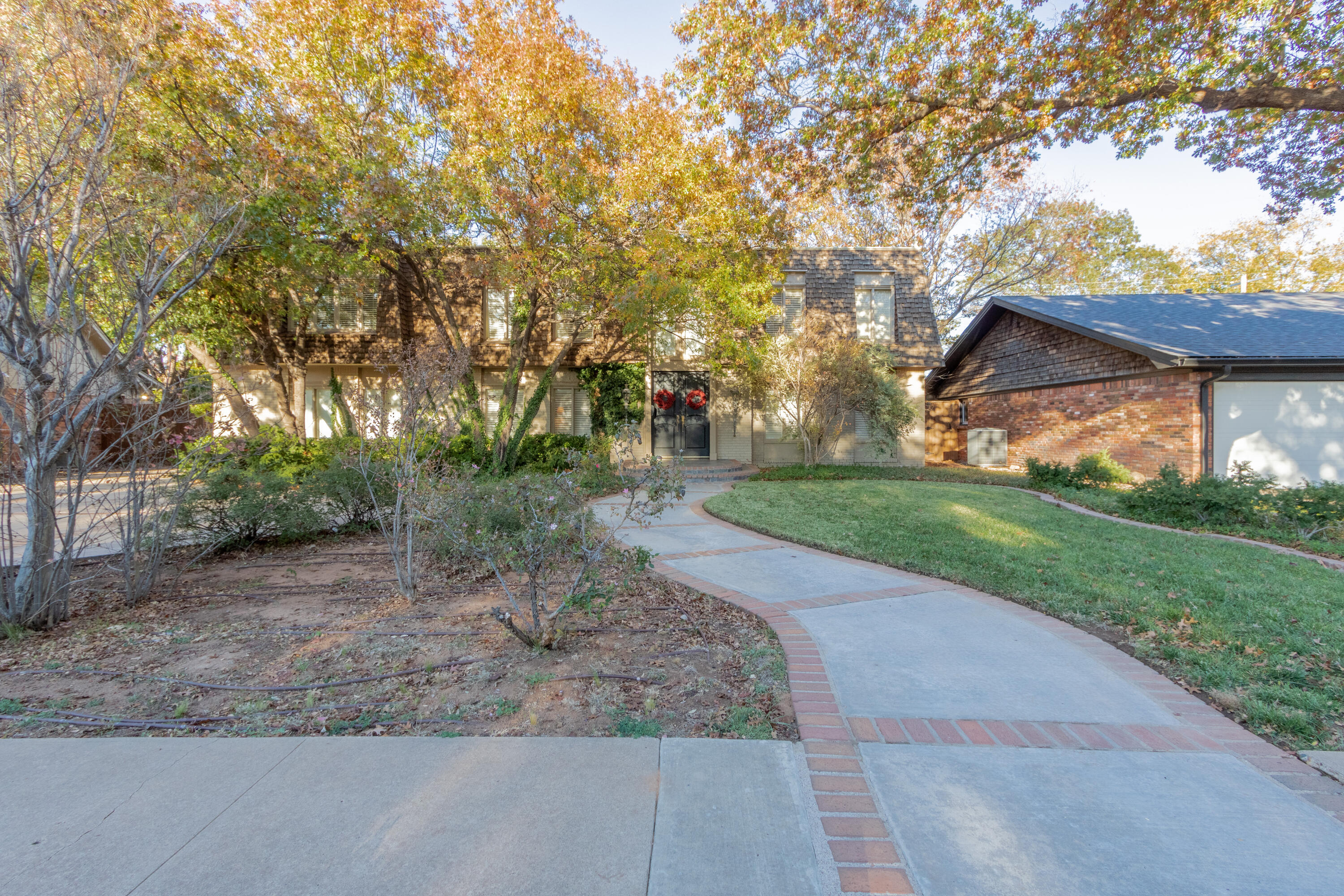 3722 63rd Drive Lubbock, TX 79413 - Photo 2 of 63 a view of a park with large trees