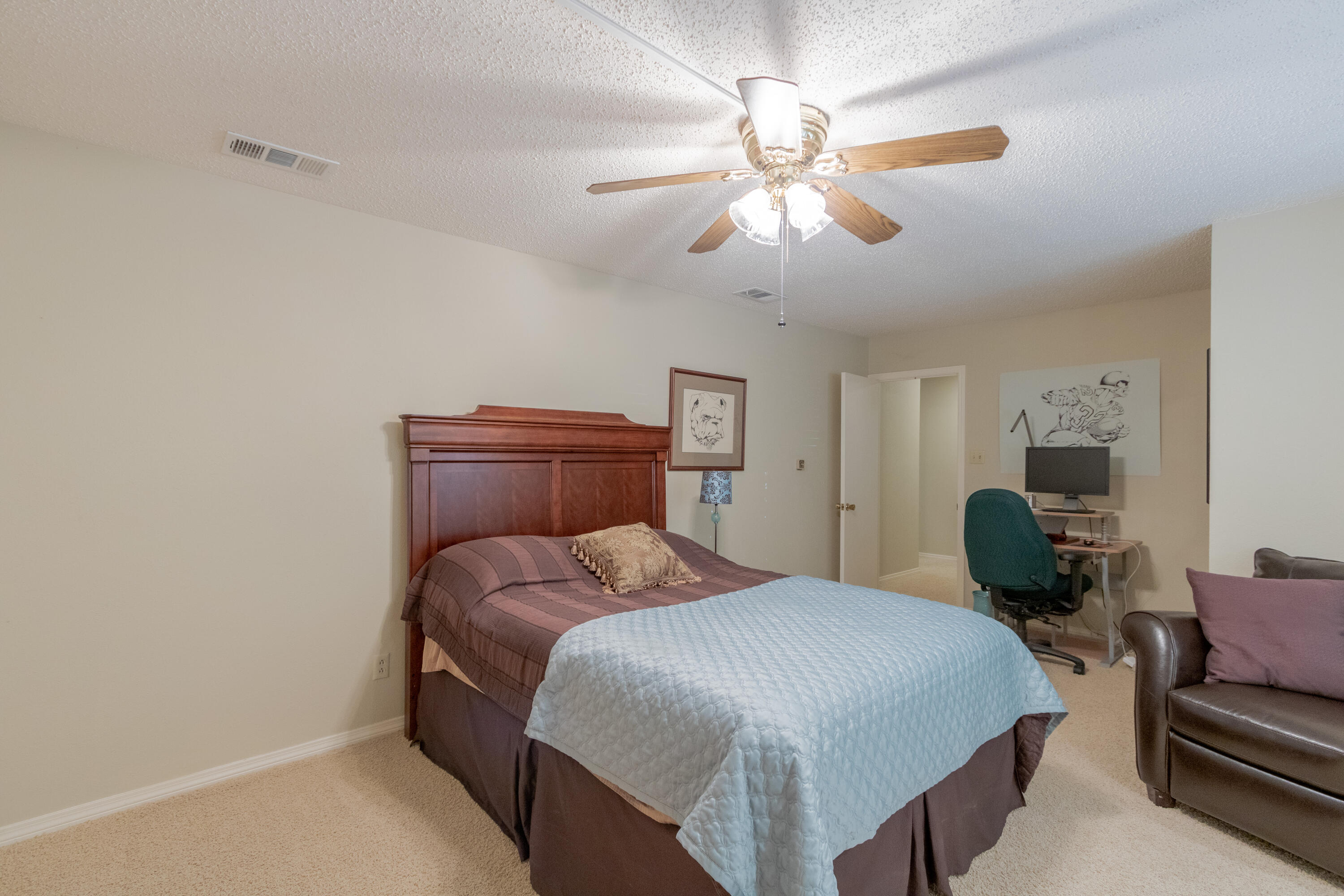 3722 63rd Drive Lubbock, TX 79413 - Photo 44 of 63 a bedroom with a bed and window