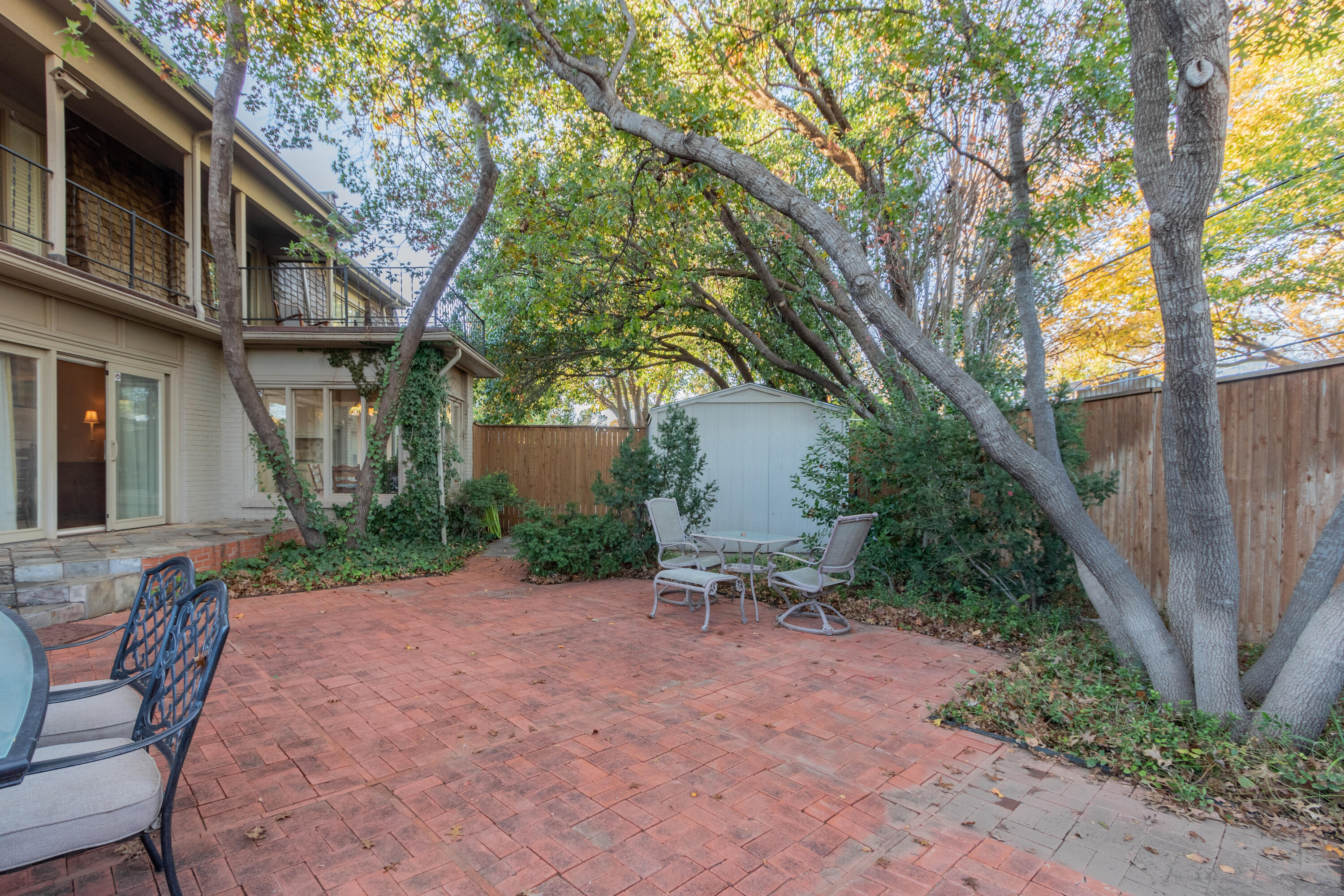 3722 63rd Drive Lubbock, TX 79413 - Photo 56 of 63 a view of backyard with a table and chairs and potted plants