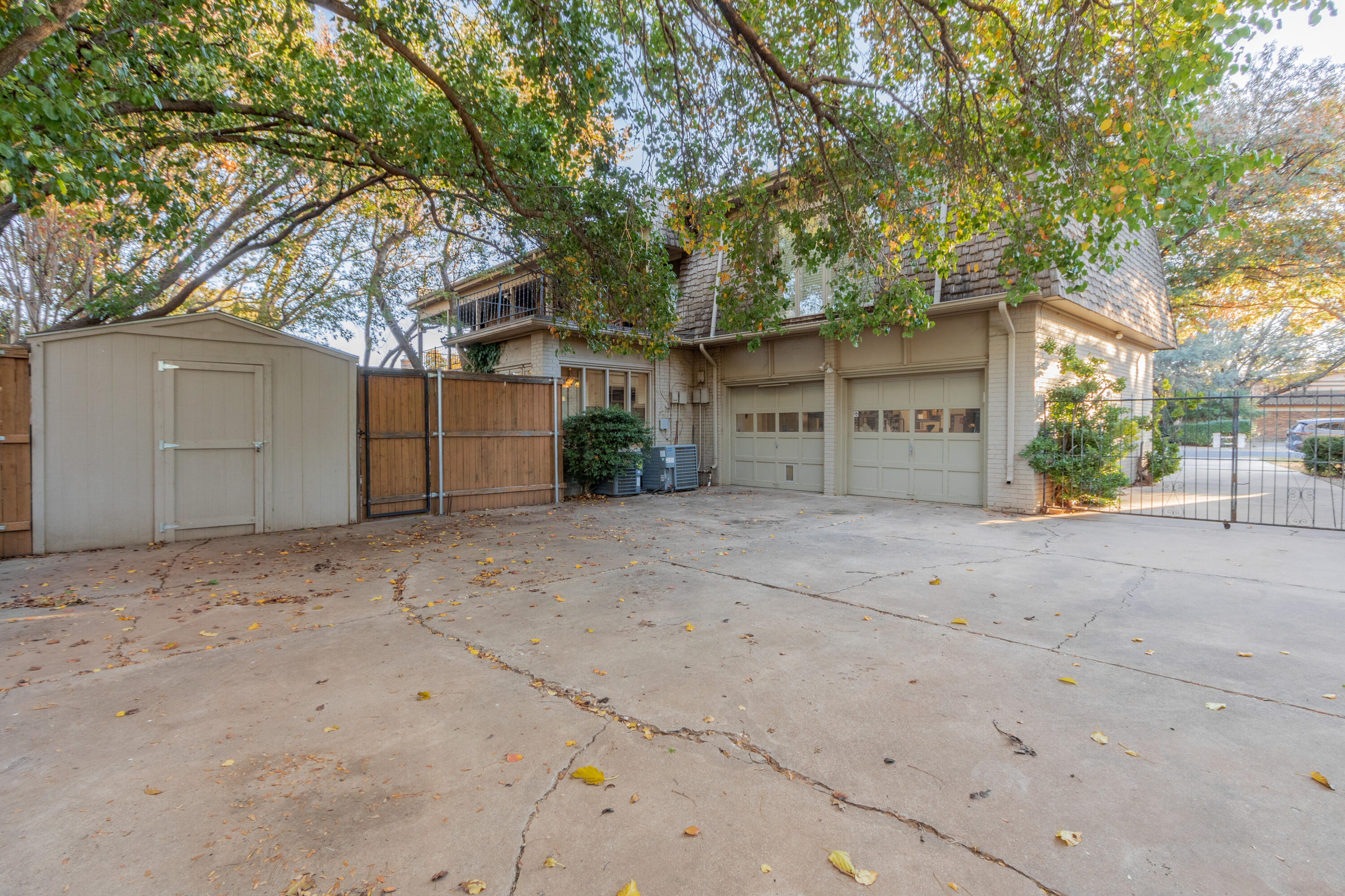 3722 63rd Drive Lubbock, TX 79413 - Photo 60 of 63 a view of a yard with a tree