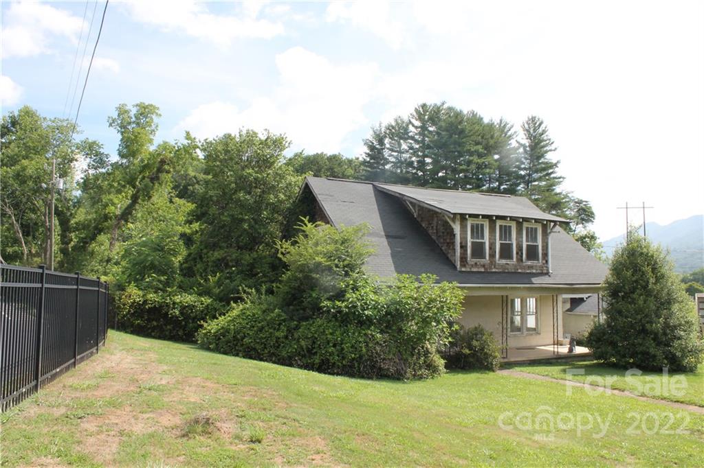 2063 Newfound Road Canton, NC 28716 - Photo 1 of 36 a front view of house with yard