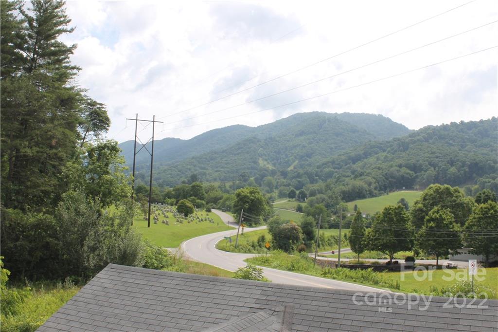 2063 Newfound Road Canton, NC 28716 - Photo 2 of 36 a view of a terrace with a yard