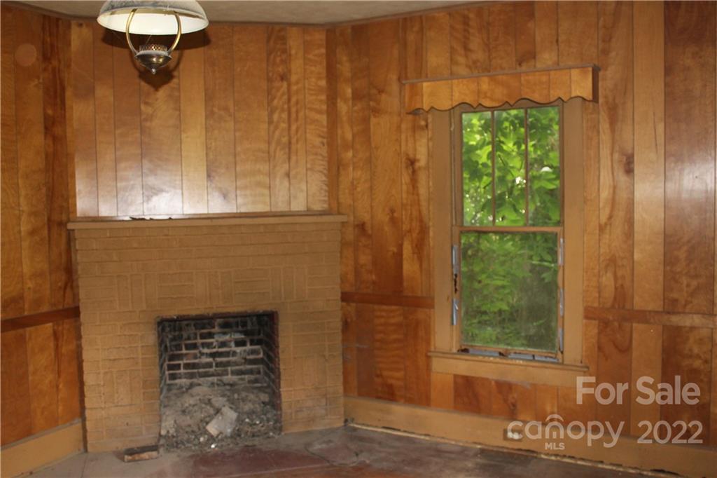 2063 Newfound Road Canton, NC 28716 - Photo 22 of 36 a front view of a house with a garden