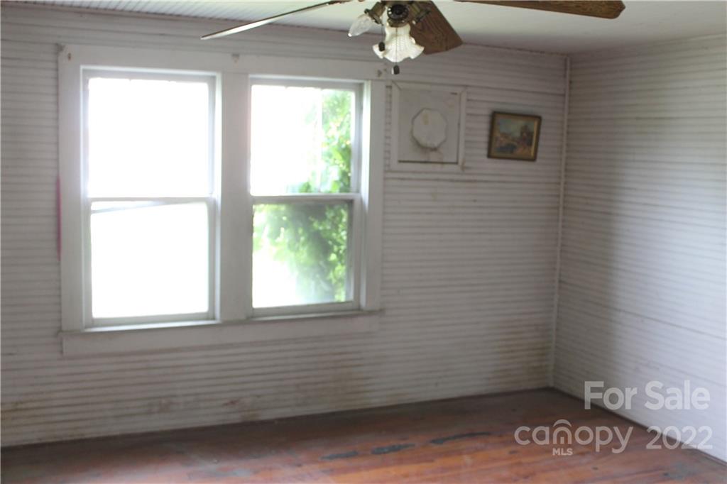 2063 Newfound Road Canton, NC 28716 - Photo 29 of 36 a view of an empty room with a window
