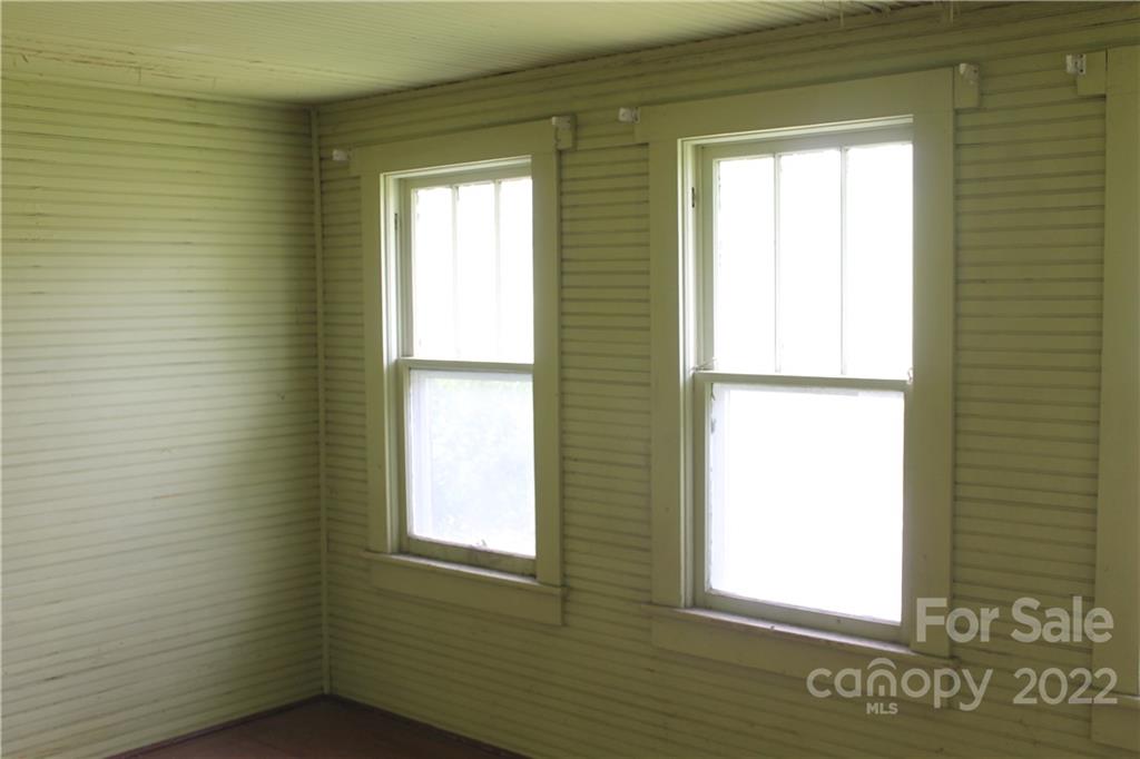 2063 Newfound Road Canton, NC 28716 - Photo 32 of 36 a view of an empty room with a window