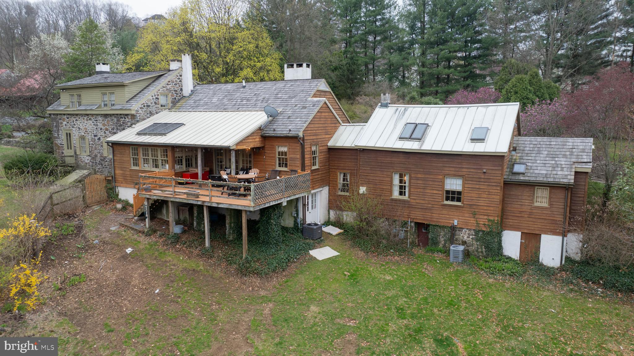 705 Schoffers Road Birdsboro, PA 19508 - Photo 12 of 112 an aerial view of a house with table and chairs