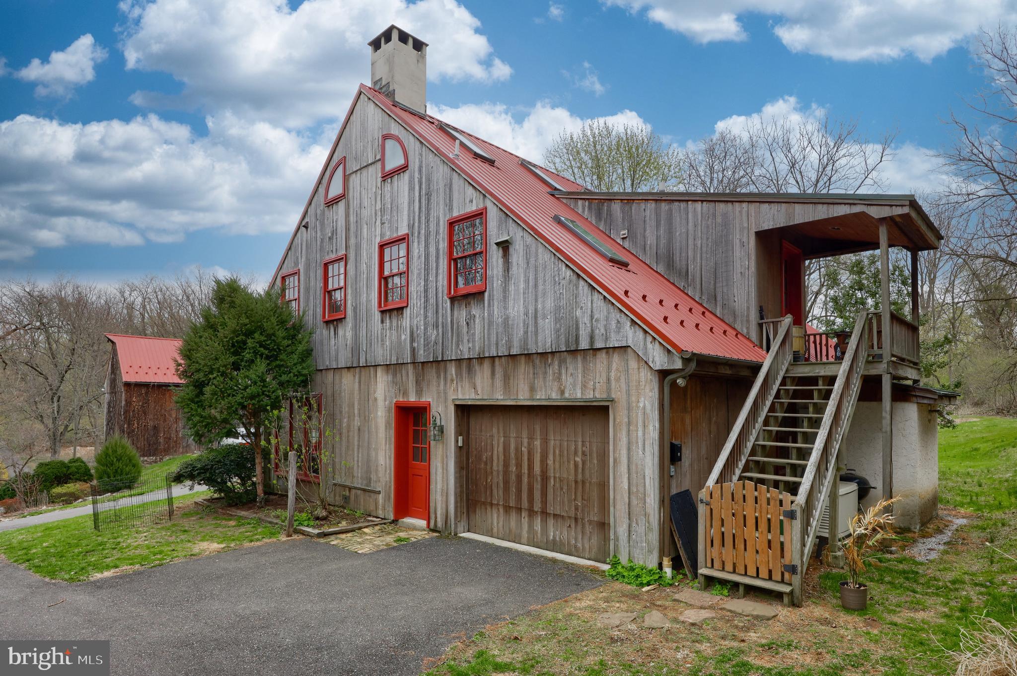 705 Schoffers Road Birdsboro, PA 19508 - Photo 20 of 112 a front view of a house with a yard