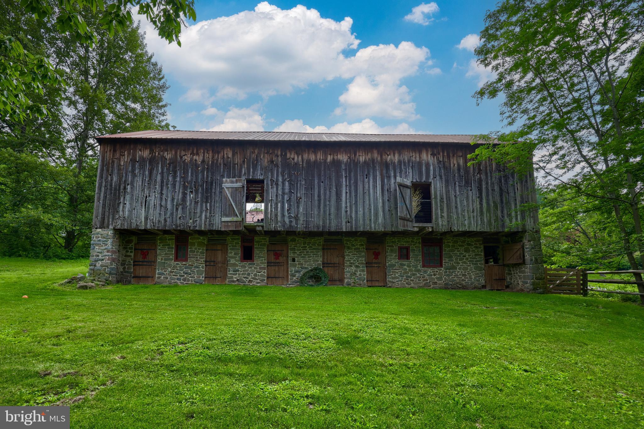 705 Schoffers Road Birdsboro, PA 19508 - Photo 23 of 112 a backyard of a house with lots of green space