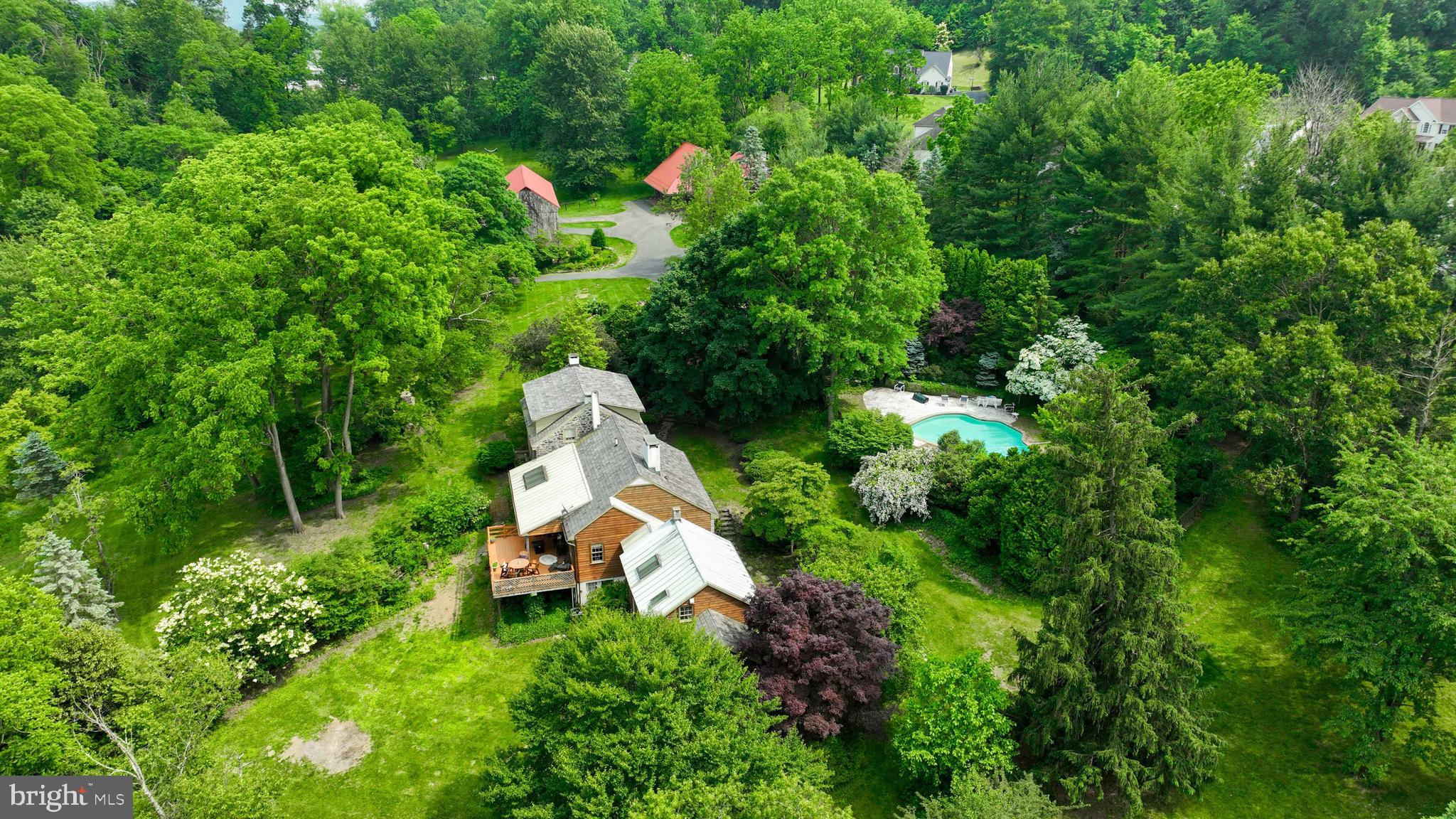 705 Schoffers Road Birdsboro, PA 19508 - Photo 5 of 112 an aerial view of a house with swimming pool and garden