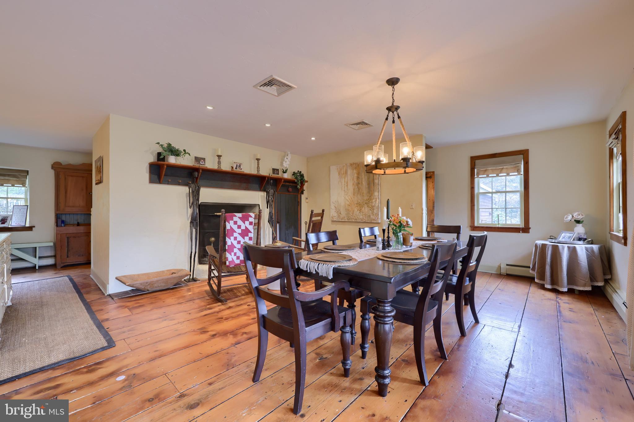 705 Schoffers Road Birdsboro, PA 19508 - Photo 53 of 112 a view of a dining room with furniture window and wooden floor