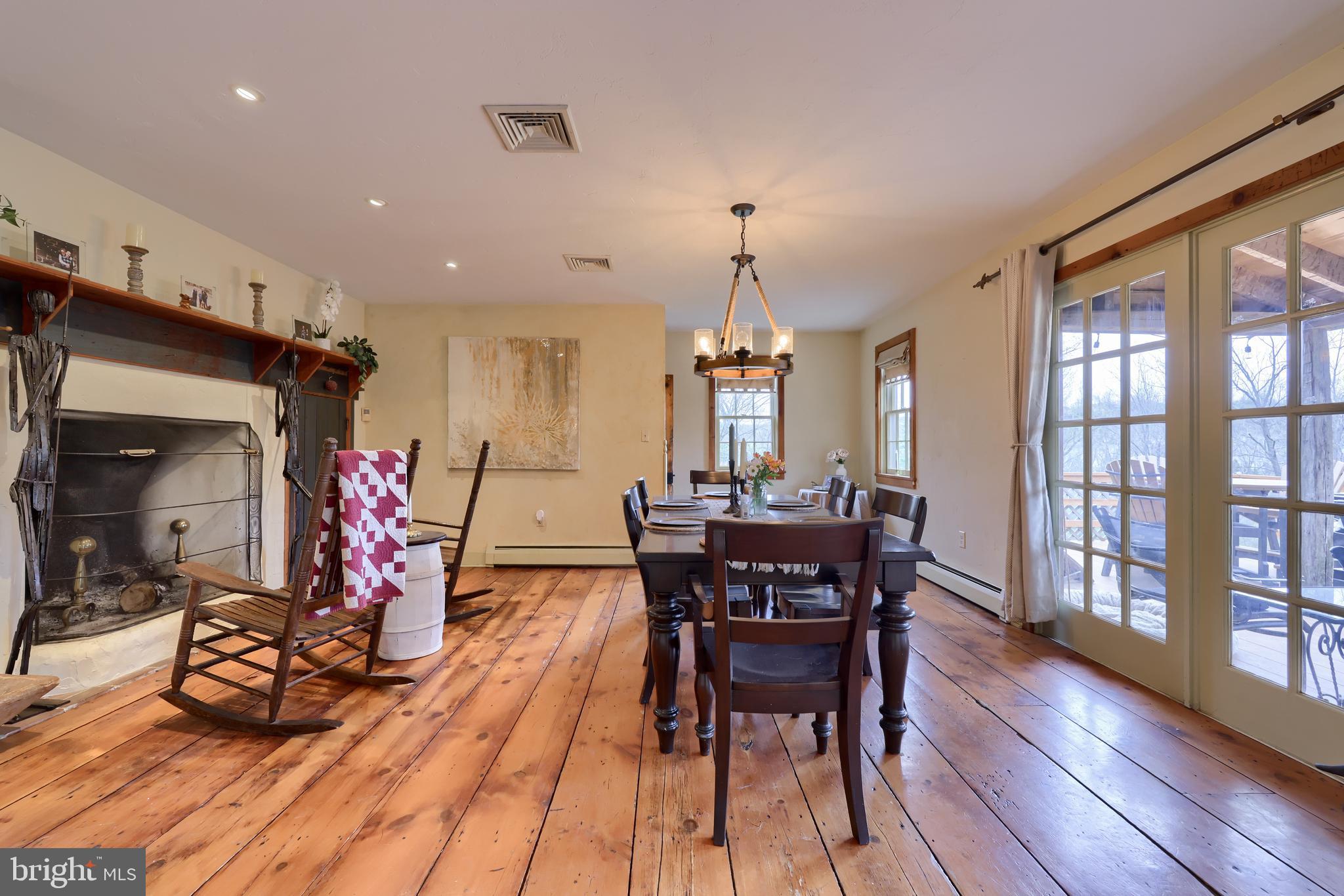 705 Schoffers Road Birdsboro, PA 19508 - Photo 54 of 112 a view of a dining room with furniture window and wooden floor