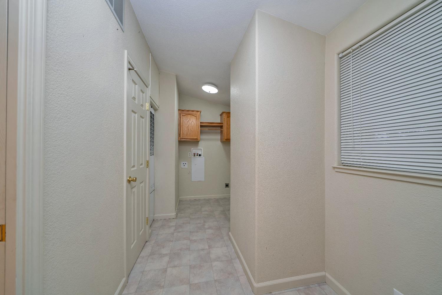 3550 China Garden Road, Unit 102 Placerville, CA 95667 - Photo 15 of 30 a view of a bathroom from a hallway