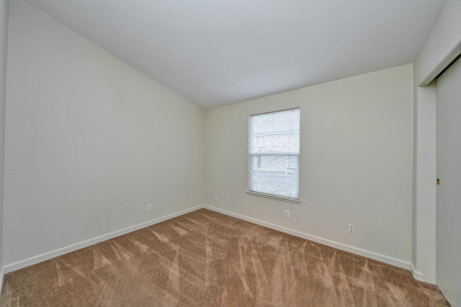3550 China Garden Road, Unit 102 Placerville, CA 95667 - Photo 20 of 30 a view of an empty room and window