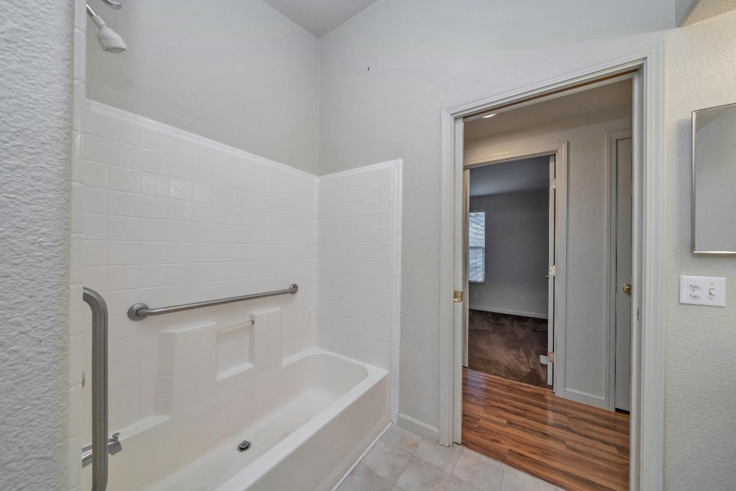 3550 China Garden Road, Unit 102 Placerville, CA 95667 - Photo 24 of 30 a bathroom with a tub and shower