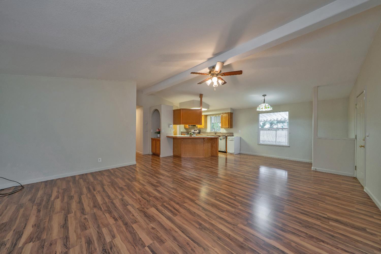 3550 China Garden Road, Unit 102 Placerville, CA 95667 - Photo 8 of 30 a view of an empty room with a window and wooden floor