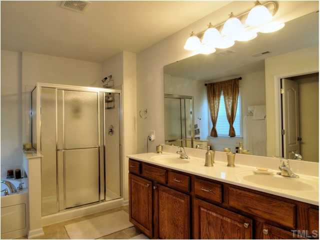 1912 Grace Point Road Morrisville, NC 27560 - Photo 10 of 25 This wonderful owner's bath has it all! Jetted tub; stand up spacious shower and dual vanities! Master Bath/Spa