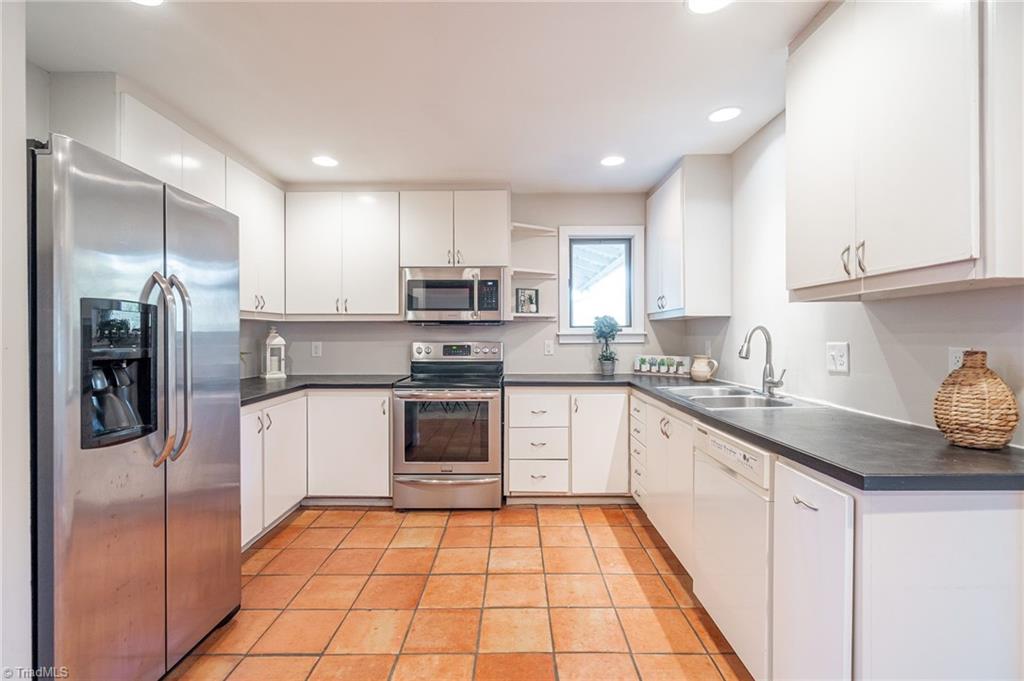 5723 Thom Road Graham, NC 27253 - Photo 11 of 41 Kitchen with Refrigerator