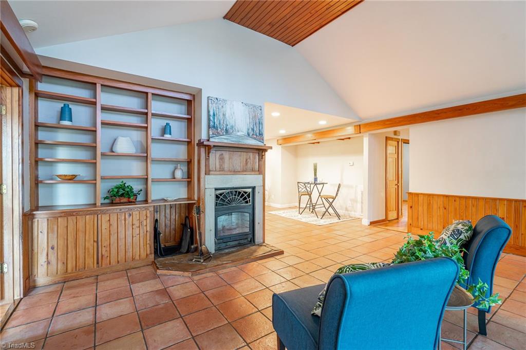 5723 Thom Road Graham, NC 27253 - Photo 20 of 41 Built in shelves and wood storage for FP