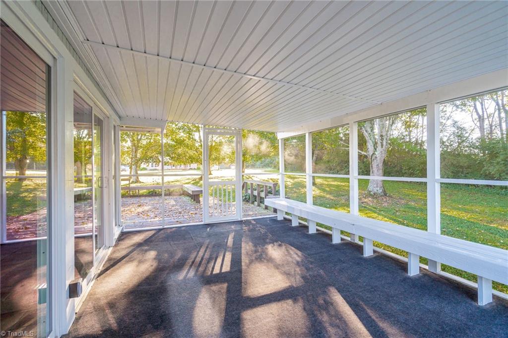 5723 Thom Road Graham, NC 27253 - Photo 21 of 41 Screen Porch looking towards front yard