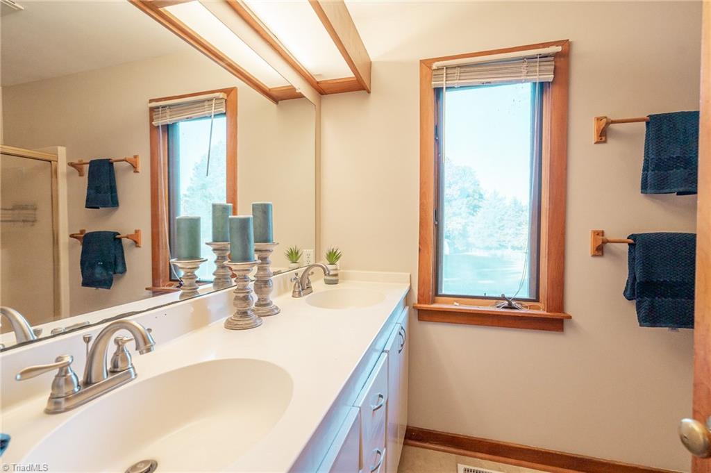 5723 Thom Road Graham, NC 27253 - Photo 26 of 41 Double sinks in primary bathroom