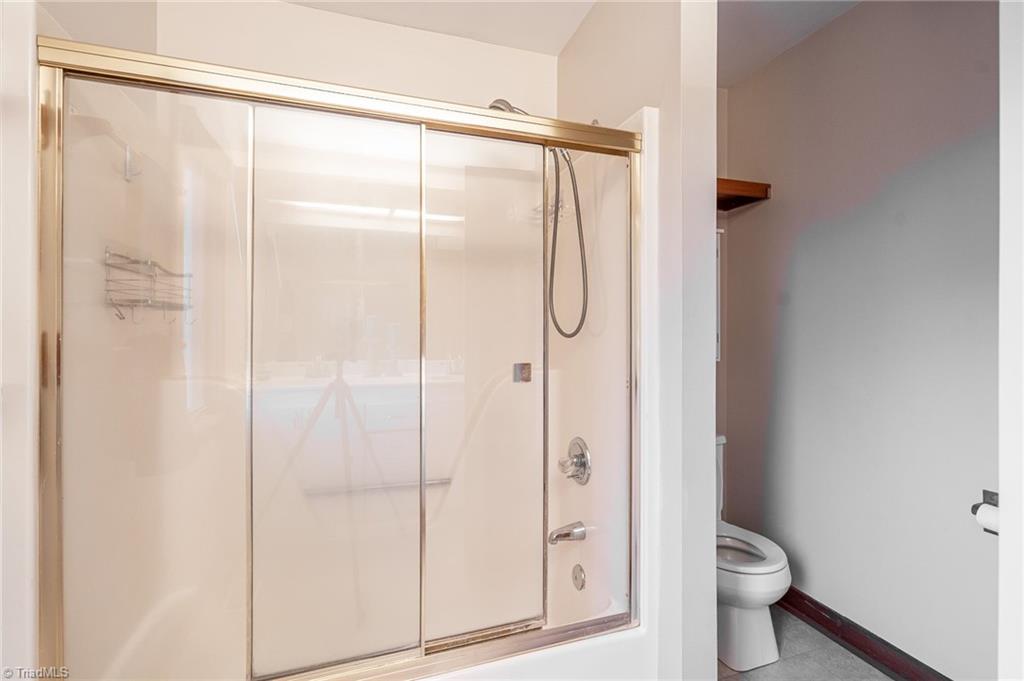 5723 Thom Road Graham, NC 27253 - Photo 27 of 41 Tub Shower Combination Primary Bathroom