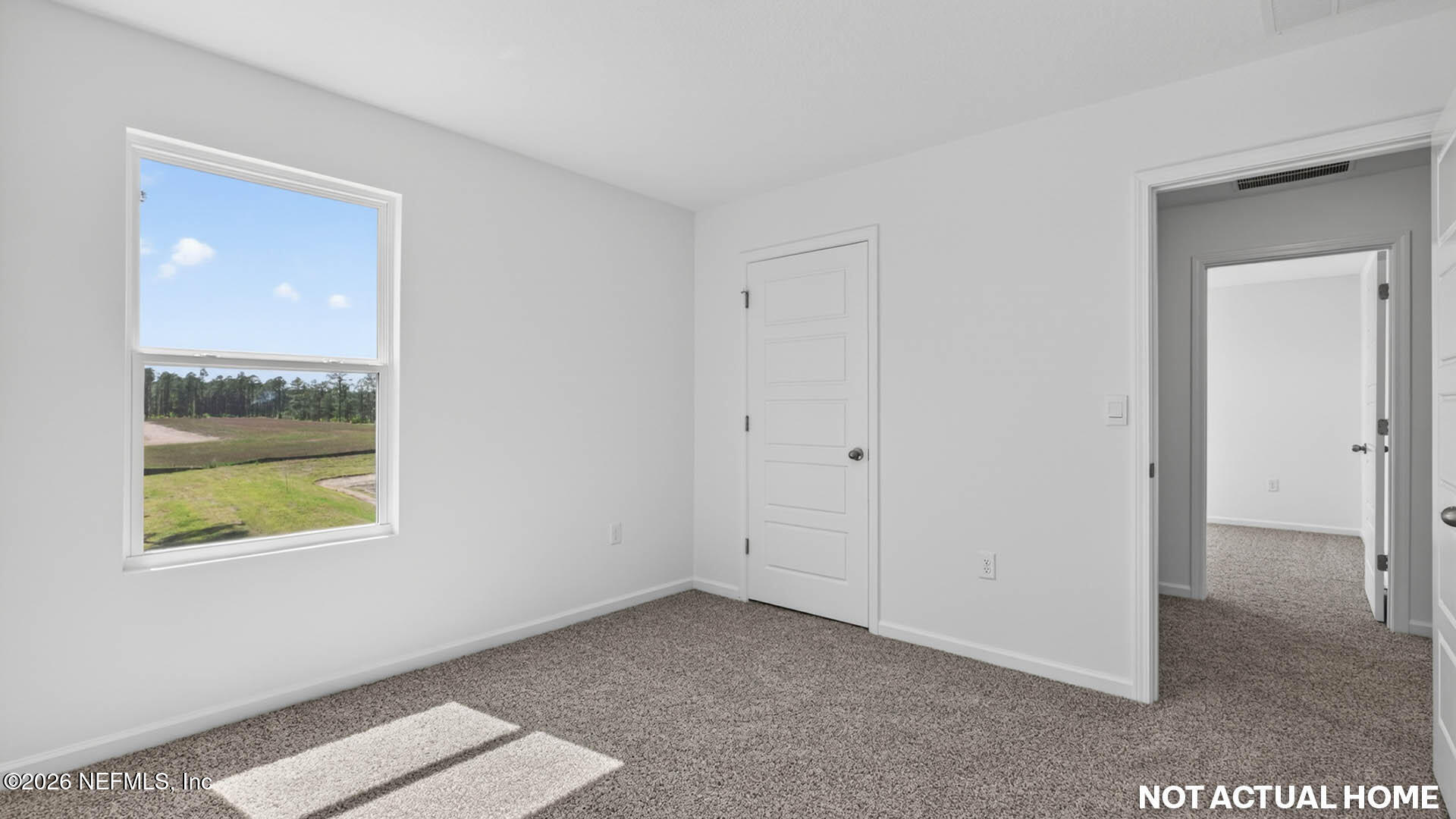 12095 Yew Tree Road Jacksonville, FL 32218 - Photo 28 of 61 a view of an empty room with a window