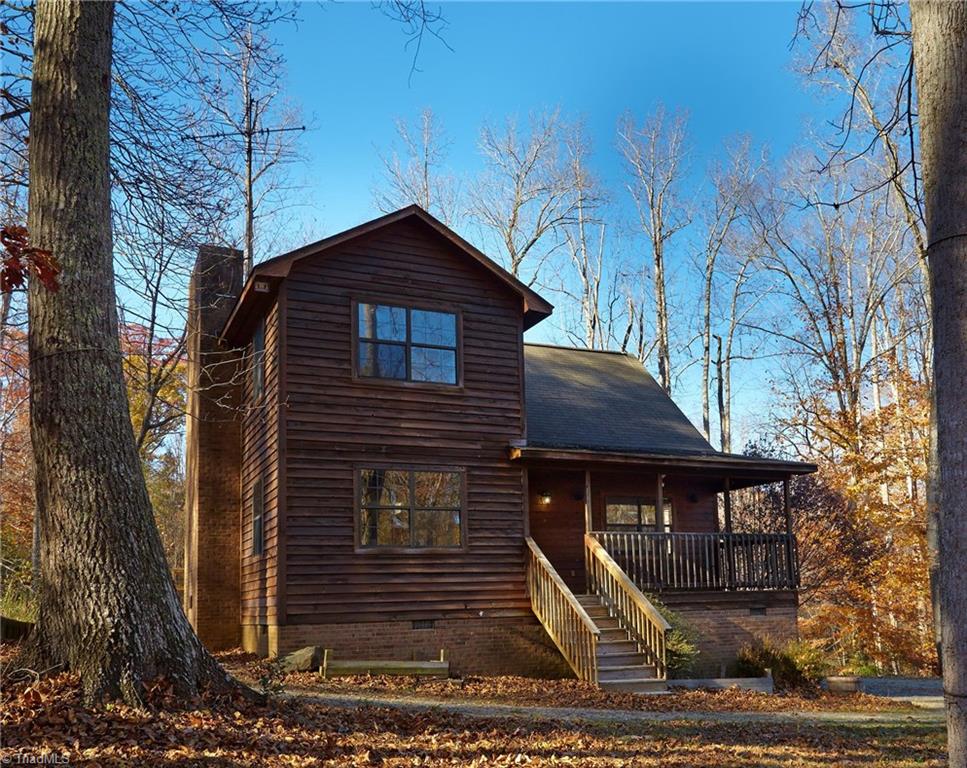 544 Neal Road Madison, NC 27025 - Photo 1 of 28 Custom built cedar country home surrounded by nature on 18.6 acres! New roof in 2008!