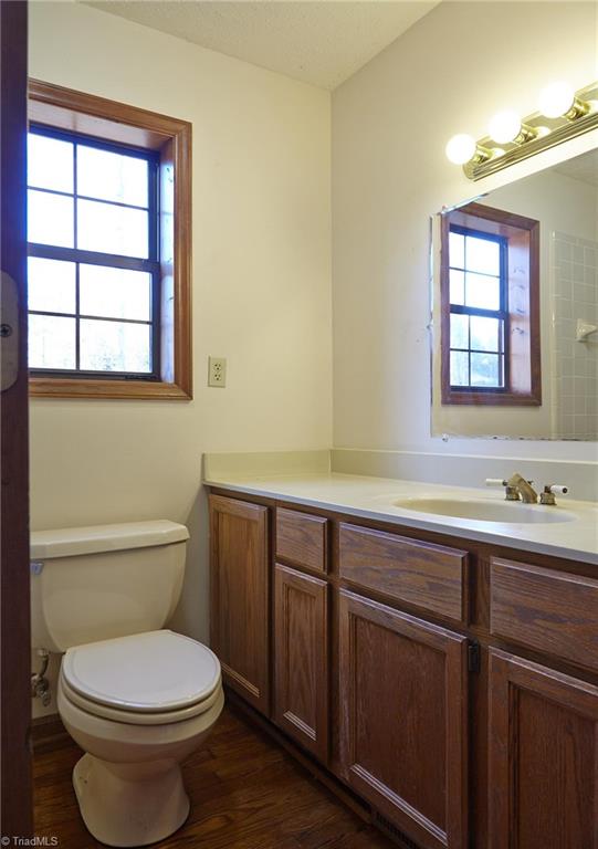 544 Neal Road Madison, NC 27025 - Photo 13 of 28 Main level full bath with marble counters and hardwood floors.