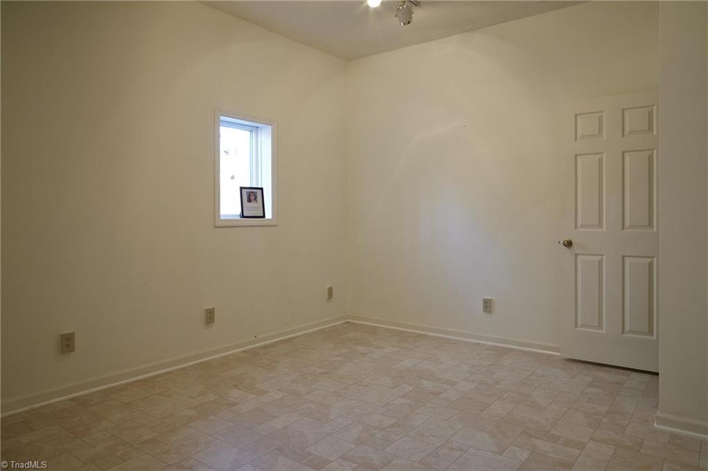 544 Neal Road Madison, NC 27025 - Photo 21 of 28 This room was a recording studio. Reba McEntire's hit song "Take it Back" was written in this studio! Could be used as an additional bedroom.