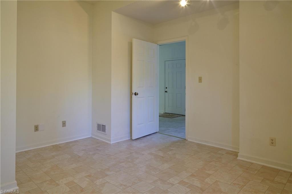 544 Neal Road Madison, NC 27025 - Photo 23 of 28 View of the outside entrance from the studio. So many possibilities for how to use this finished basement! It could be a separate business, spa/retreat, art studio.....you choose!