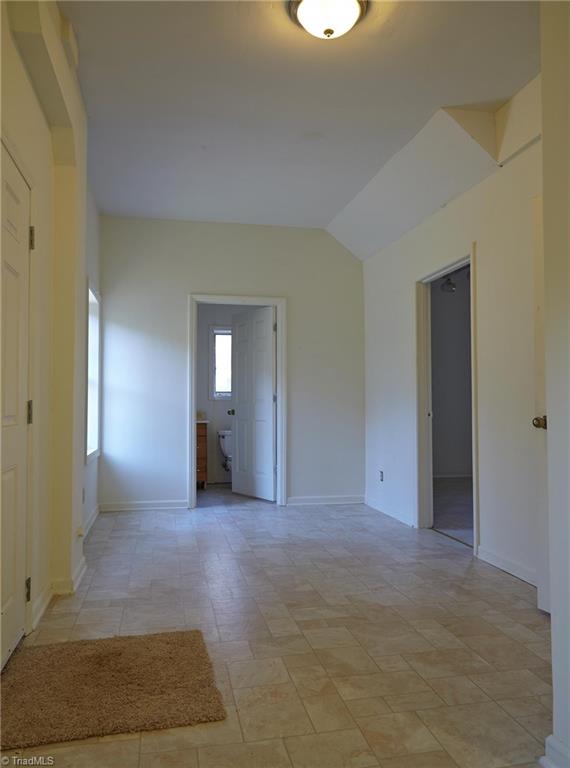 544 Neal Road Madison, NC 27025 - Photo 24 of 28 Outside entrance to finished basement leads into what could be a mud room, or a parlor for any business you may have. There's a full bath!