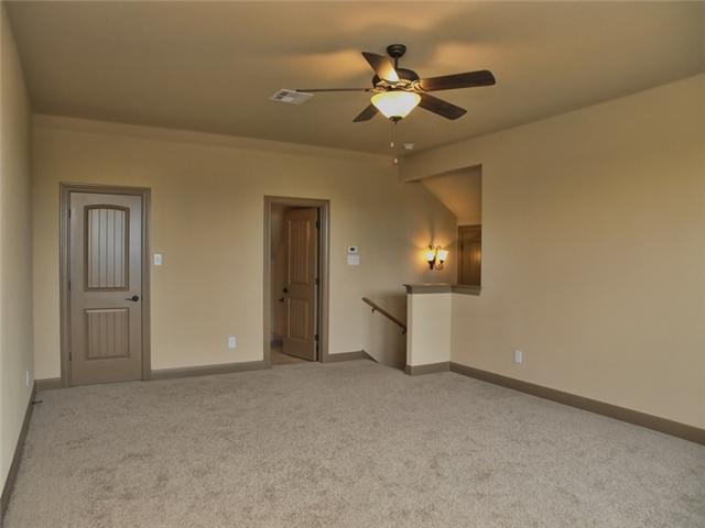 104 Vista Lane Georgetown, TX 78633 - Photo 24 of 36 This extra large room is located upstairs and could serve a an additional Primary Suite, living space or fun retreat area.