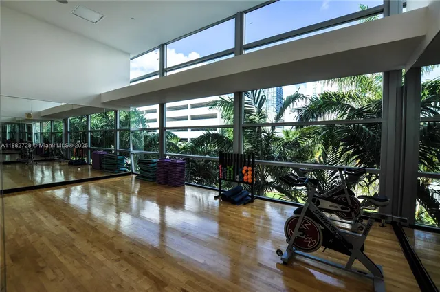 a view of a swimming pool with seating space
