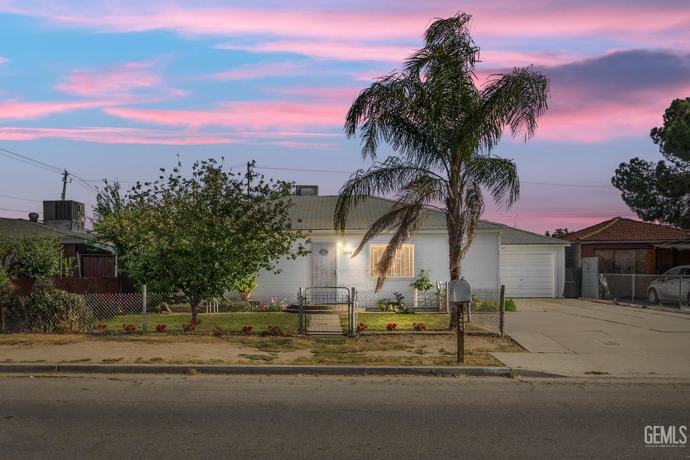 a view of a house with a ocean view