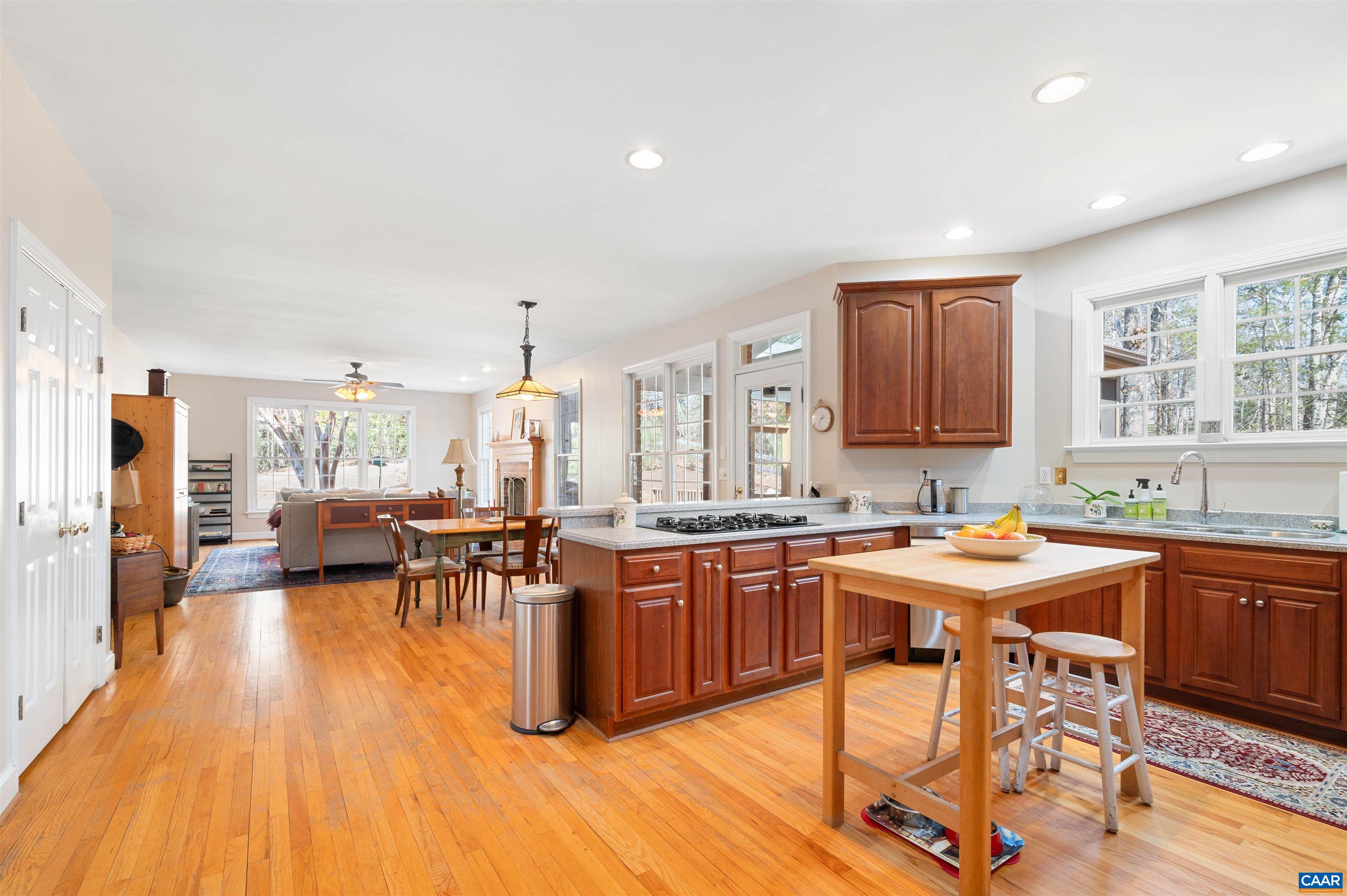 891 Old Ballard Road Charlottesville, VA 22901 - Photo 12 of 49 a kitchen with lots of counter top space and dining table
