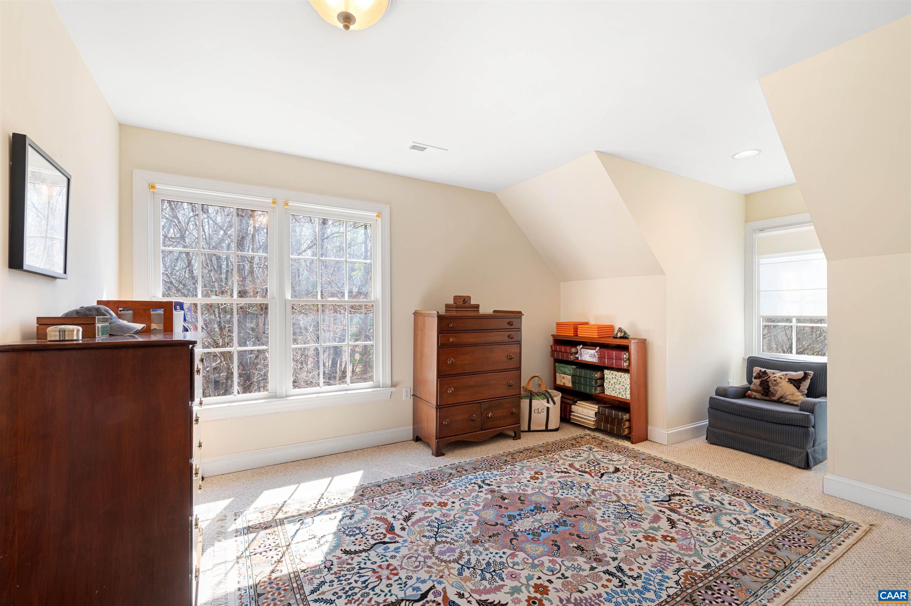 891 Old Ballard Road Charlottesville, VA 22901 - Photo 28 of 49 a view of a bedroom with furniture and windows