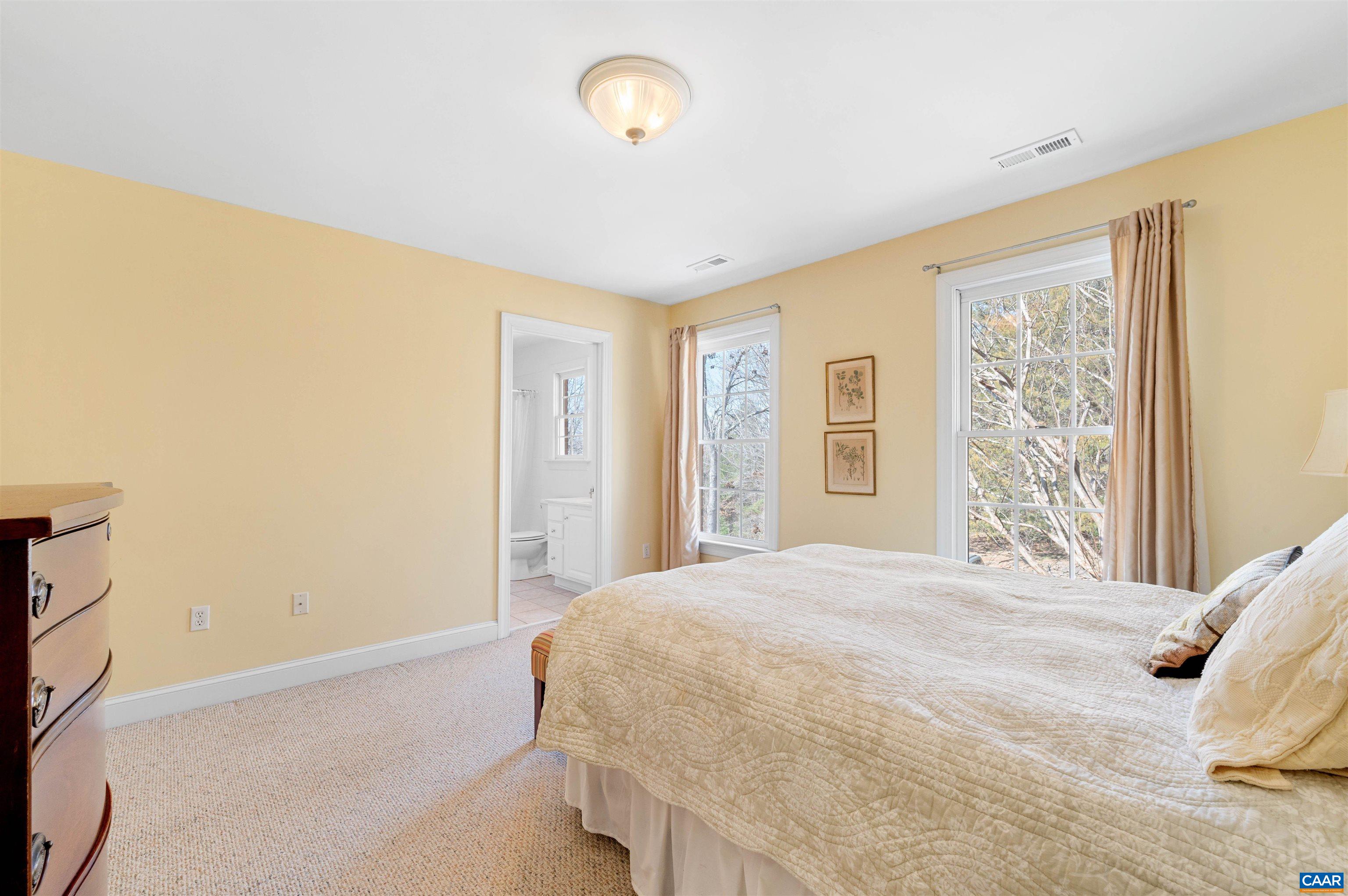 891 Old Ballard Road Charlottesville, VA 22901 - Photo 35 of 49 a bedroom with a bed and a window
