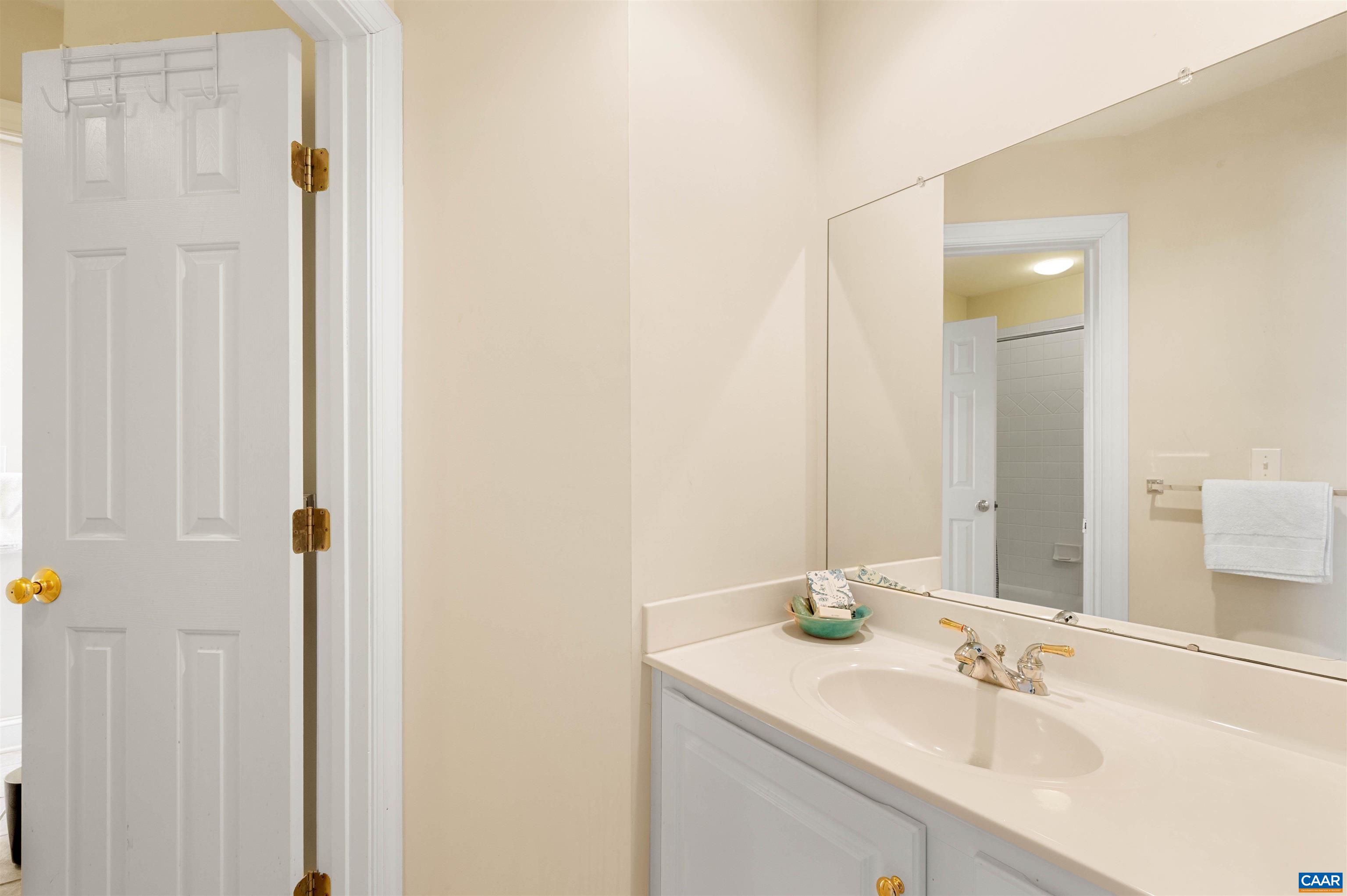 891 Old Ballard Road Charlottesville, VA 22901 - Photo 39 of 49 a bathroom with a sink and a mirror