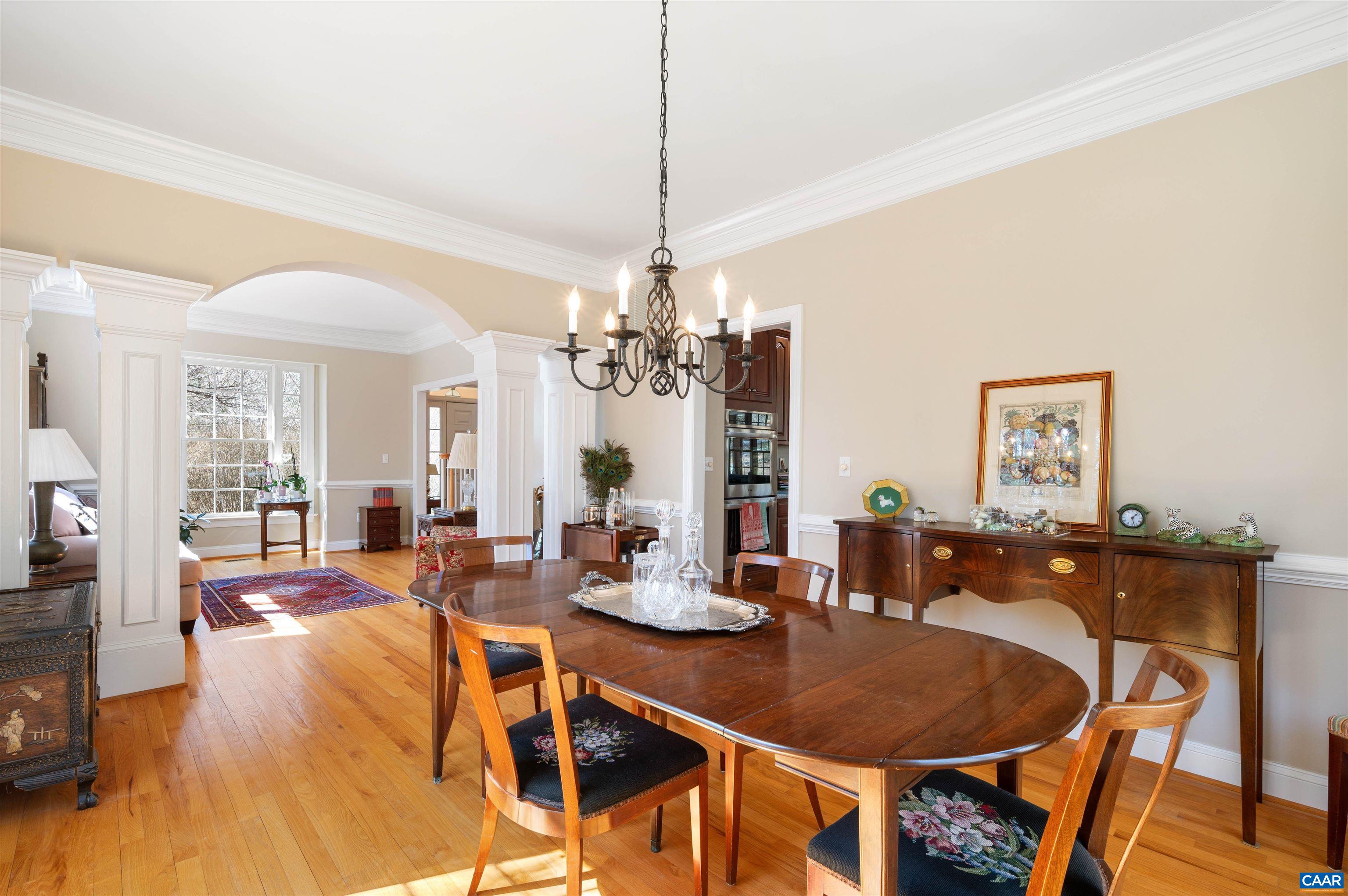 891 Old Ballard Road Charlottesville, VA 22901 - Photo 5 of 49 a view of a dining room with furniture window and wooden floor