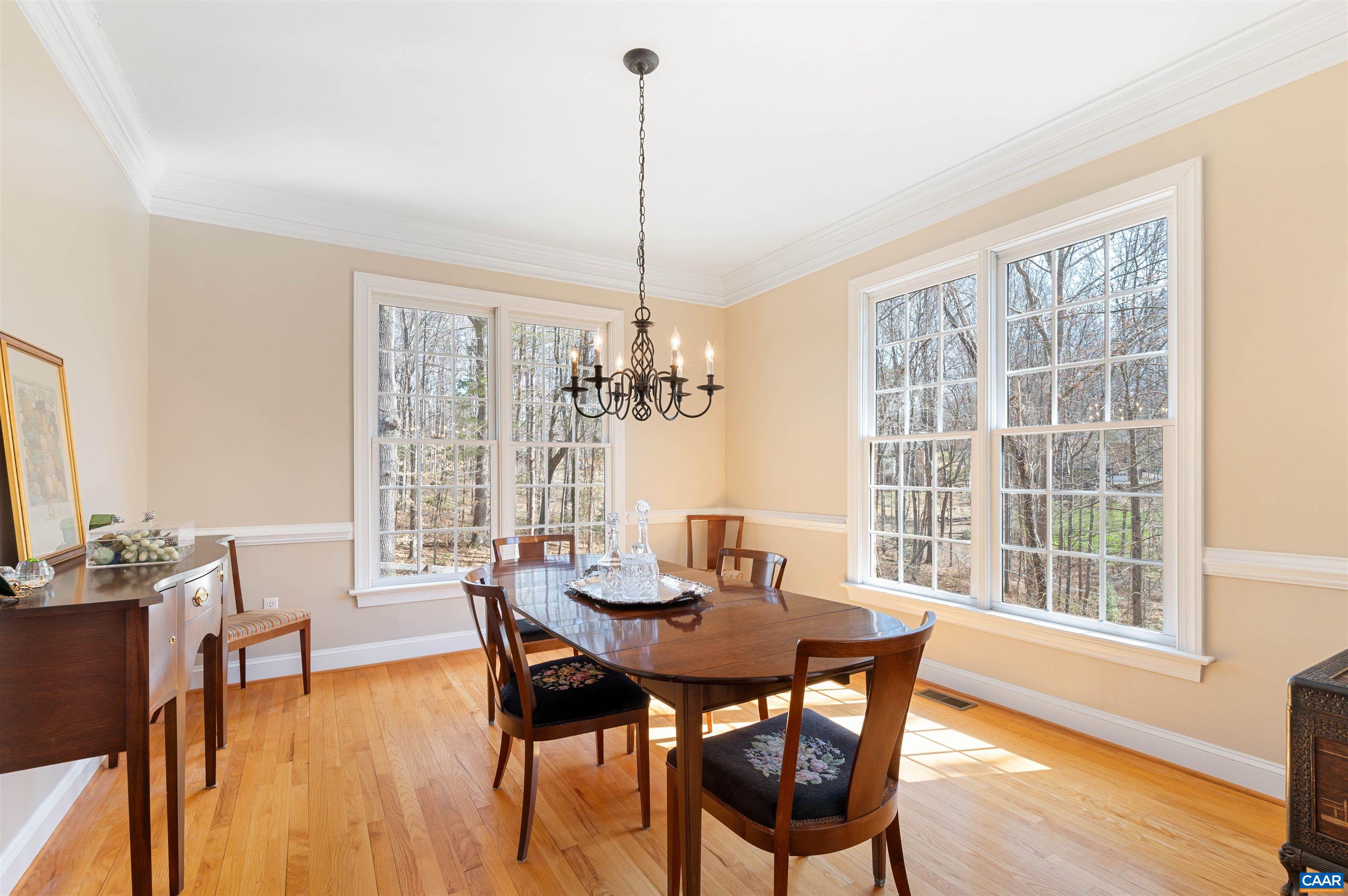 891 Old Ballard Road Charlottesville, VA 22901 - Photo 6 of 49 a view of a dining room with furniture window and wooden floor